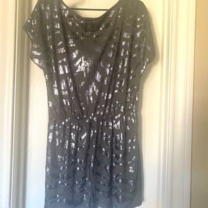 Show stopper! Gray shirt dress that can be worn on and off one shoulder.